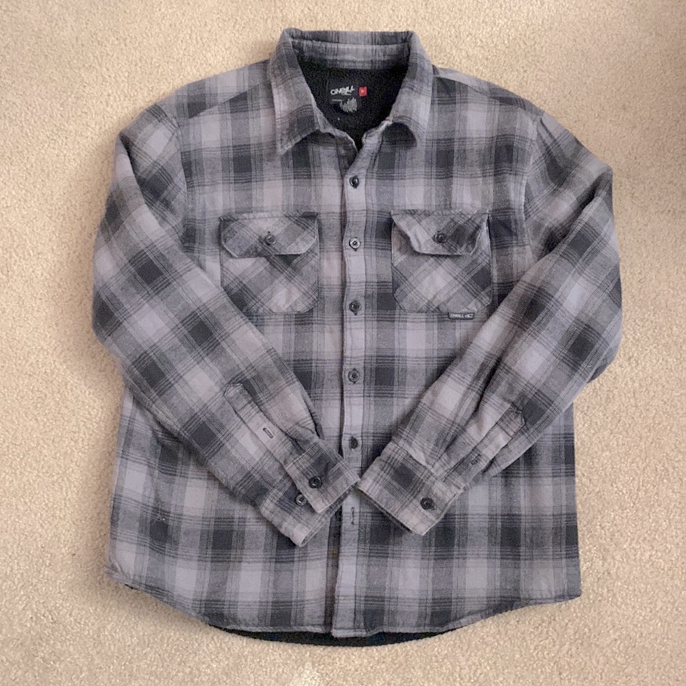 Oneil flannel, fleece lined. New condition, only been worn a few times.